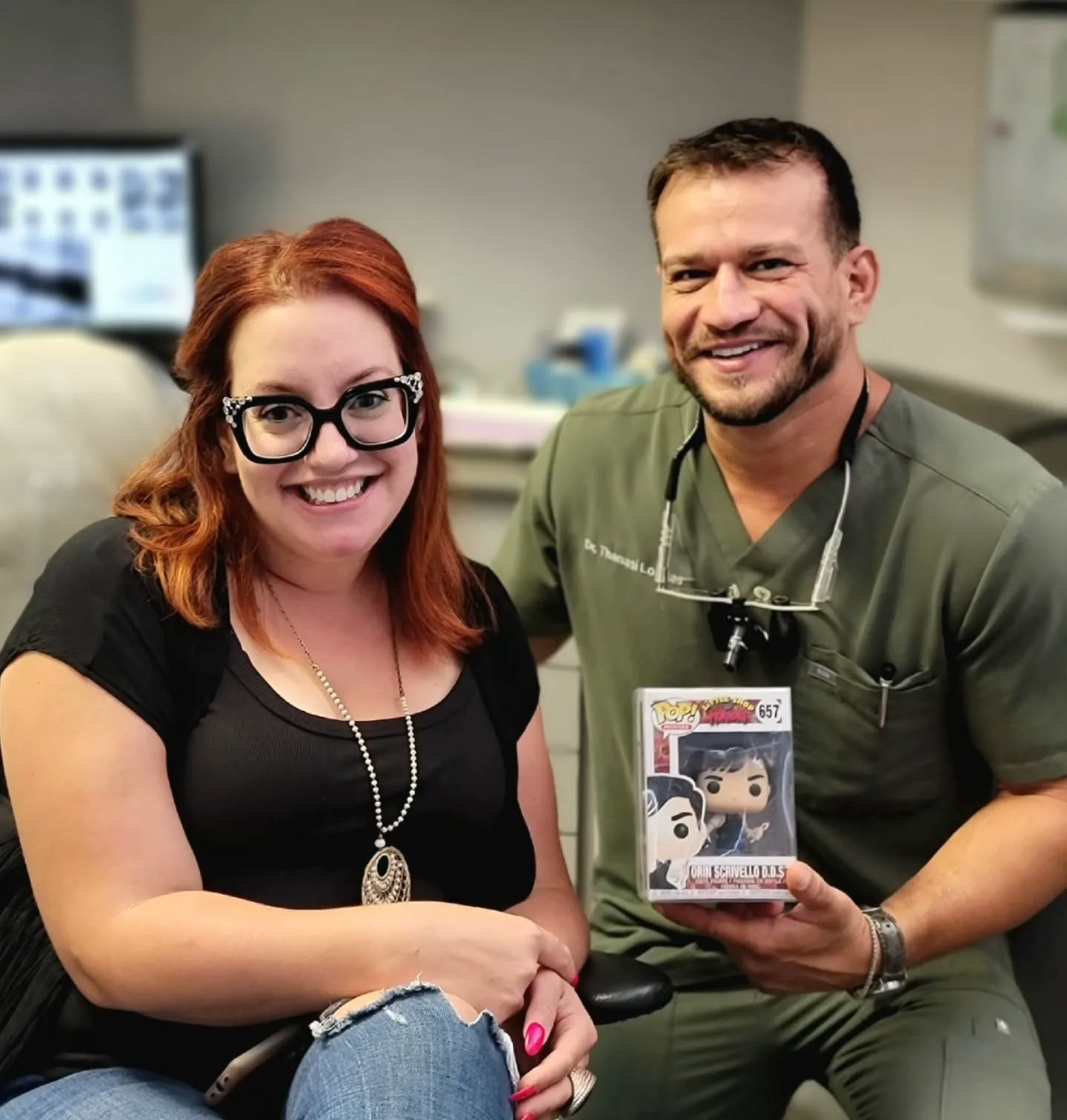 Dr. Thanasi Loukas Park Ridge dentist with happy patient at Loukas Dentistry