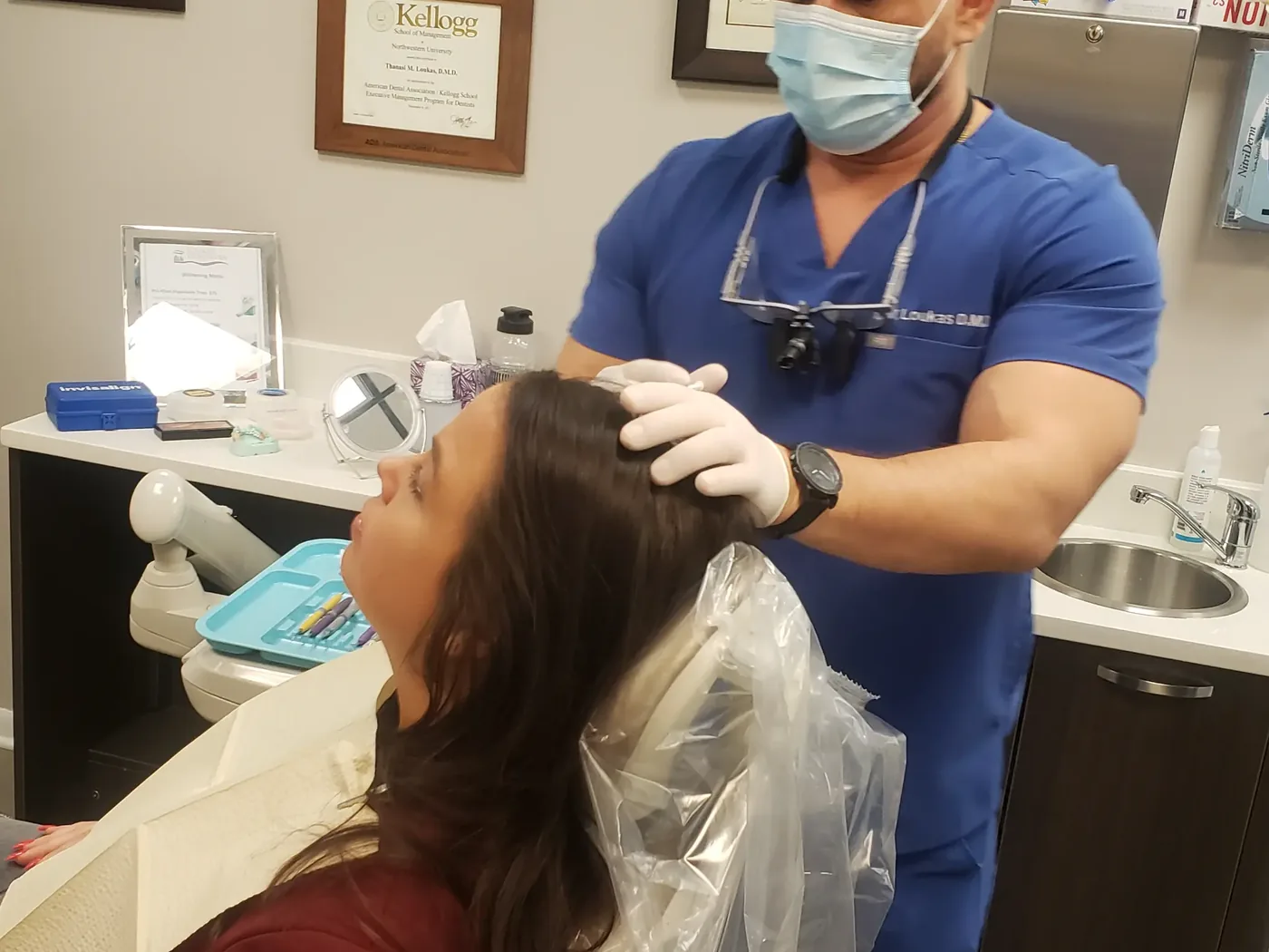 Dr Thanasi Loukas providing Botox treatment at Loukas Dentistry in Park Ridge