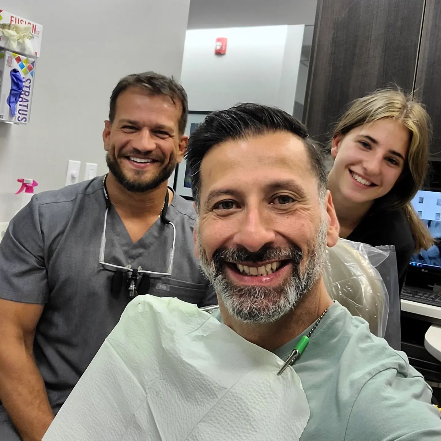 Dr. Loukas and team members in the operatory at Loukas Dentistry of Park Ridge, Illinois